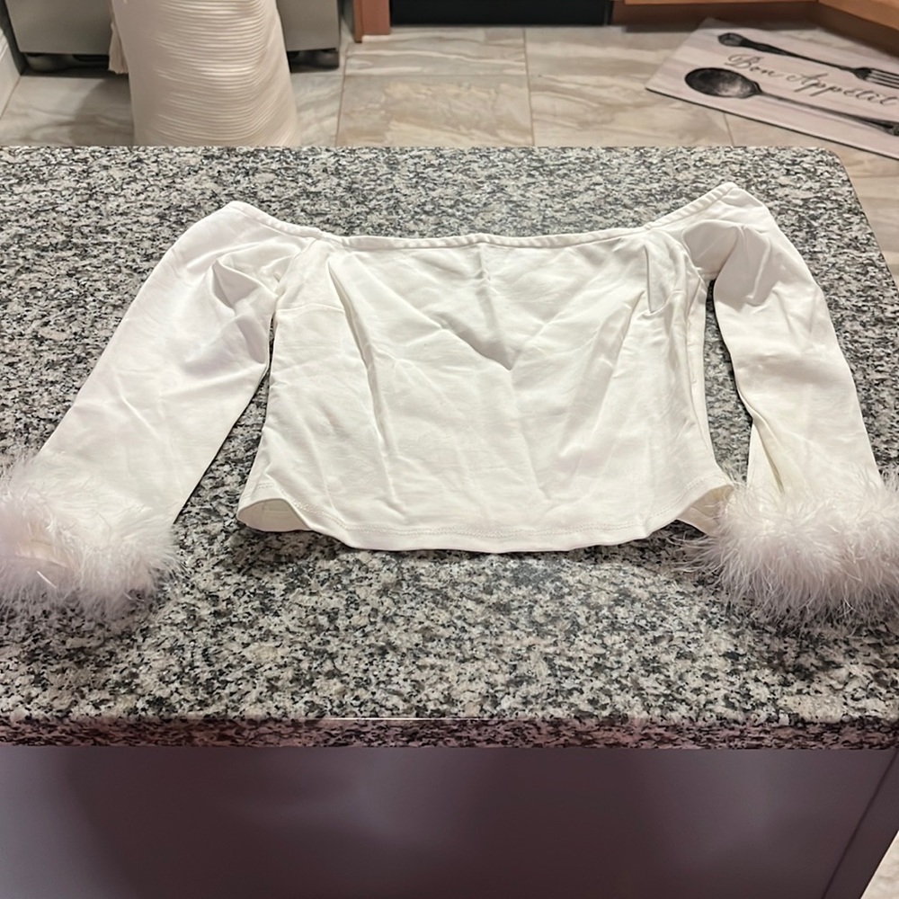 White off the shoulder feather sleeve crop top